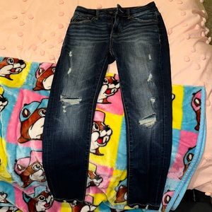 Buckle black ripped jeans
